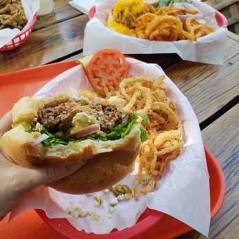 Hondo's - My giant burger, the onion strings were not that great. But the burger was tasty. - Bars Near Me - Fredericksburg, Texas