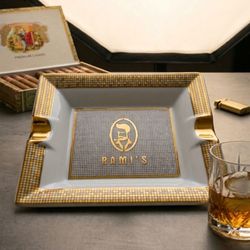 Let's Smoke - Luxury gold-detailed ceramic ashtray by Rami's Accessories. Elegant design for the modern cigar lounge. Shop the collection at Let's Smoke