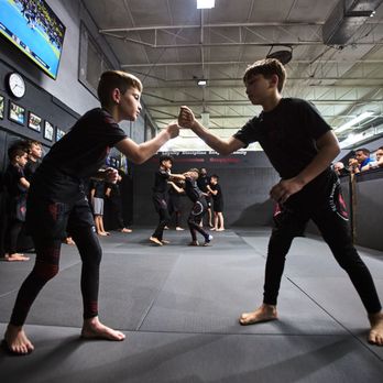 Real Submission Grappling - Kids No-Gi grappling class at RSG Hialeah in action. - Self-defense Classes Near Me - Hialeah, Florida Real Submission Grappling - Kids No-Gi grappling class at RSG Hialeah in action. - Self-defense Classes Near Me - Hialeah, Florida