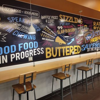 Slap Burger - a long table with chairs in front of it - Burgers Near Me - El Paso, Texas