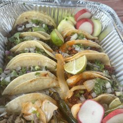 Mexican Grill - Amazing tray of a dozen tacos.   Came with rice and beans and soda.