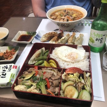 Kimchi - Bento box with pork, gyoza, chicken ramen - Korean Near Me - Ithaca, New York