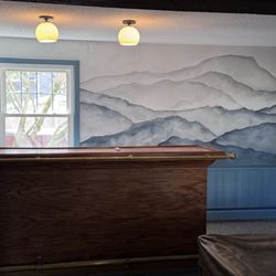 Belaget Painting & Services - Gameroom & entertaiment area transformation. Room fully fixed and prep. Banquette and walls painted & wall mural pannel installed.