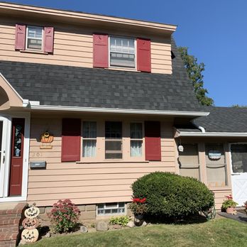 Big Dog Construction - the front of a house - Decks & Railing Near Me