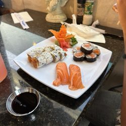 Sakura Asian Fusion - 8 Pieces Eel Lover Roll , 6 Pieces Salmon Roll , 2 Pieces Salmon Nigiri