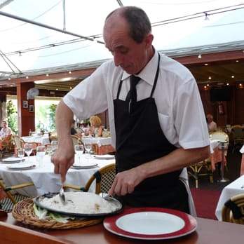 La Barca del Salamanca - Antonio serving the fish for us - Seafood Near Me - Barcelona, B La Barca del Salamanca - Antonio serving the fish for us - Seafood Near Me - Barcelona, B