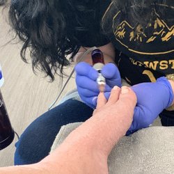 Polished Salon - Using an efile on my toes rather than take her time