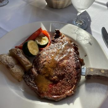 Trattoria Giorgio - Ribeye special with roasted potato and vegetables - Italian Near Me - Greenville, South Carolina Trattoria Giorgio - Ribeye special with roasted potato and vegetables - Italian Near Me - Greenville, South Carolina