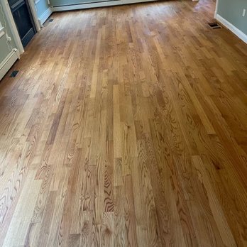 AJ Floor Service - Living room floors, golden oak, after second coat oil poly. Natural lighting. - Flooring Near Me