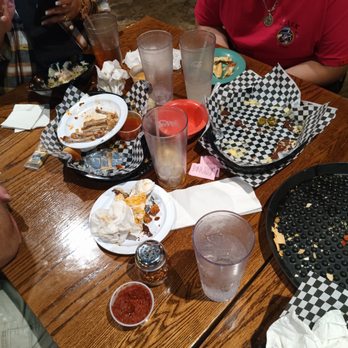 Brick Oven Pizza - Nederland - a table of food and drinks - Pizza Near Me - Nederland, Texas Brick Oven Pizza - Nederland - a table of food and drinks - Pizza Near Me - Nederland, Texas