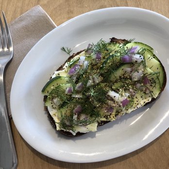 Lighthouse Coffee - Cucumber Toast ($6.75)  Cream cheese, cucumber, red onion, dill, and lemon pepper.   Love the reusable ware :) - Coffee & Tea Near Me - Santa Barbara, California