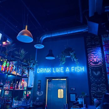 Fishbowl at The Banks - a neon sign above the bar - Tiki Bars Near Me - Cincinnati, Ohio Fishbowl at The Banks - a neon sign above the bar - Tiki Bars Near Me - Cincinnati, Ohio