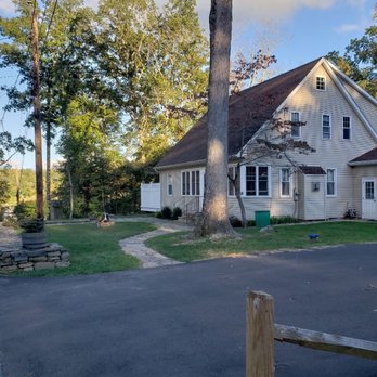 ARA Property Care - a white house with a brown roof - Landscaping Near Me - East Haddam, Connecticut ARA Property Care - a white house with a brown roof - Landscaping Near Me - East Haddam, Connecticut