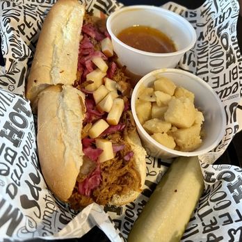Schweini's Delicatessen - Slow roasted pork - Sandwiches Near Me - Winter Garden, Florida Schweini's Delicatessen - Slow roasted pork - Sandwiches Near Me - Winter Garden, Florida