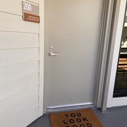 Suite 200! Greeted by a "YOU LOOK GOOD" welcome mat :)