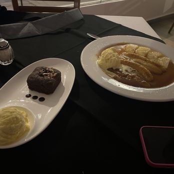 Rincón de Buenos Aires - Brownie and ice cream and bananas flambe (bananas foster). The bananas flambe are done table side and I highly recommend it. - Argentine Near Me - Puerto Vallarta, JAL Rincón de Buenos Aires - Brownie and ice cream and bananas flambe (bananas foster). The bananas flambe are done table side and I highly recommend it. - Argentine Near Me - Puerto Vallarta, JAL