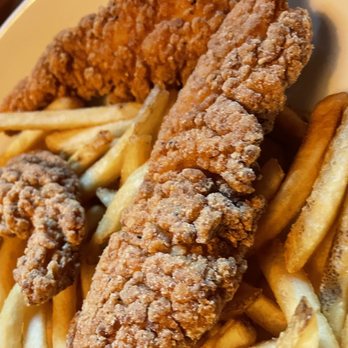 Surf Club - a plate of fried fish and french fries - Cocktail Bars Near Me - Newport, Rhode Island Surf Club - a plate of fried fish and french fries - Cocktail Bars Near Me - Newport, Rhode Island