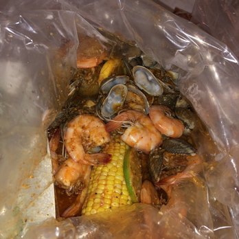 Holly Crab - Shrimp head off and clams combo with holly medium - Seafood Near Me - Boston, Massachusetts Holly Crab - Shrimp head off and clams combo with holly medium - Seafood Near Me - Boston, Massachusetts