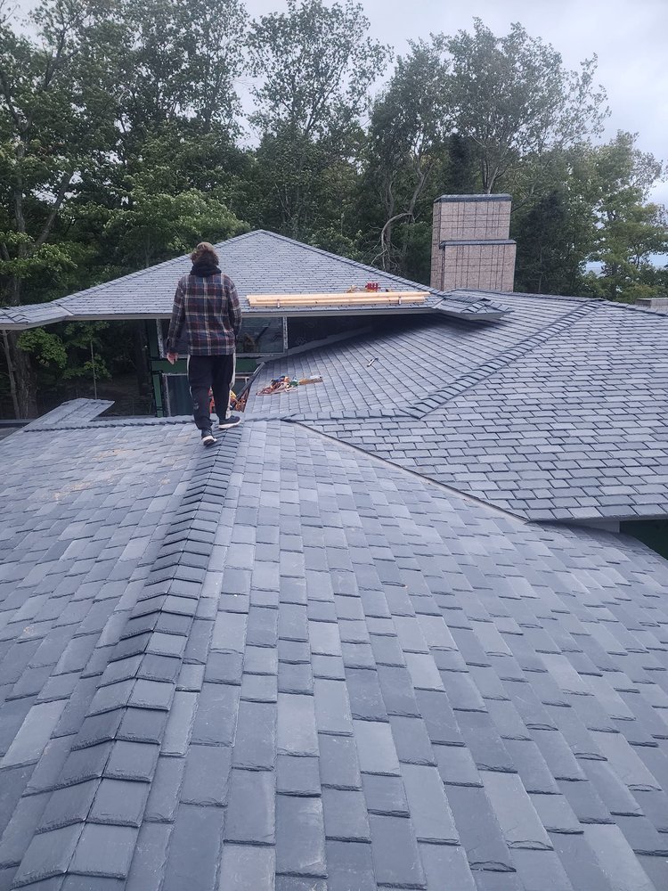 Slide of Archyk Roofing