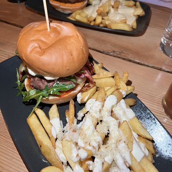 The Devil's Advocate - Beef Burger with Parmesan truffle chips (front) and sweet potato burger with garlic sauce chips - Wine Bars Near Me - Edinburgh, EDH