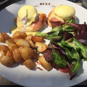 Duet Bakery and Restaurant - Salmon Avovado Benedict with a side salad and fried potatoes. - American Near Me - Brooklyn, New York Duet Bakery and Restaurant - Salmon Avovado Benedict with a side salad and fried potatoes. - American Near Me - Brooklyn, New York