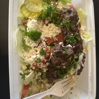 Heroes Meals - Partly eaten, Iraqi kabab over salad - Mediterranean Near Me - Midland, Texas