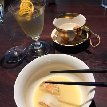 Saison - Saison and scallop with milk punch in glass - New American Near Me - San Francisco, California