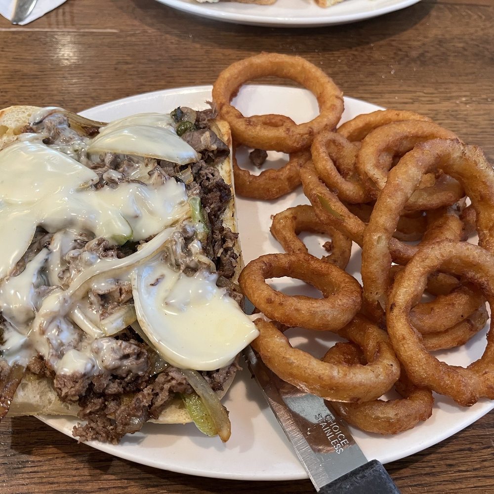 Jack's Cafe - Philly cheesesteak sandwich with onion rings - American Near Me - Tremont, Illinois Jack's Cafe - Philly cheesesteak sandwich with onion rings - American Near Me - Tremont, Illinois
