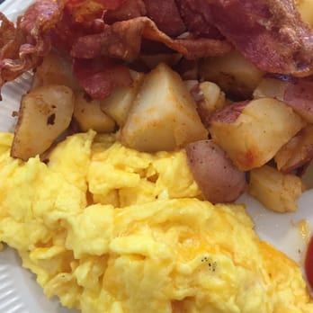 Catering By Scott - Scrambled eggs with cheddar cheese, served with bacon, home fries and an orange garnish - Delis Near Me - Columbus, Ohio Catering By Scott - Scrambled eggs with cheddar cheese, served with bacon, home fries and an orange garnish - Delis Near Me - Columbus, Ohio