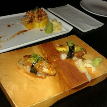 Arata Sushi - Special oyster with soy bean sauce.  One on the right is cooked ...left raw.  This was given compliments of the chef. - Japanese Near Me - Syosset, New York
