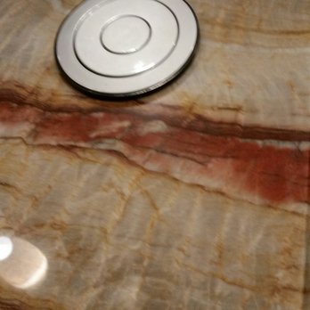 Starlight Marble & Granite - Os and his Dad came by and drilled another hole on island for this pop up electrical outlet/ USB charger. - General Contractors Near Me - Livermore, California