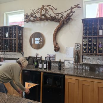 Barr Estate Winery - Behind the bar, with their logo - Wineries Near Me - Paso Robles, California