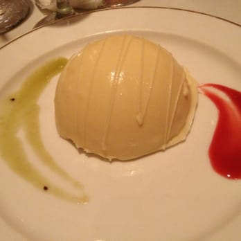 Bolingbrook Golf Club - Lemon Mousse Cake Covered in White Chocolate - Golf Near Me - Bolingbrook, Illinois Bolingbrook Golf Club - Lemon Mousse Cake Covered in White Chocolate - Golf Near Me - Bolingbrook, Illinois