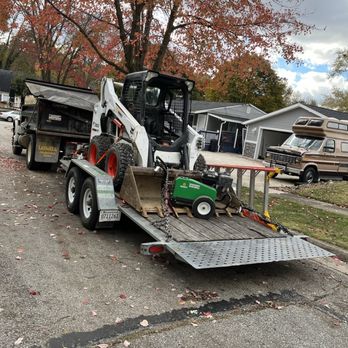 BAMM Construction Services Inc - a bobcat on a trailer - General Contractors Near Me - Tampa, Florida BAMM Construction Services Inc - a bobcat on a trailer - General Contractors Near Me - Tampa, Florida