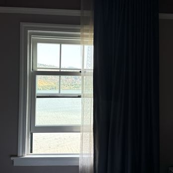 Columbia Gorge Hotel - River view with drapes open. - Hotels Near Me - Hood River, Oregon Columbia Gorge Hotel - River view with drapes open. - Hotels Near Me - Hood River, Oregon