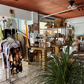 Es Que Market - a clothing store with clothes on racks - Sandwiches Near Me - Albuquerque, New Mexico