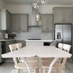 Ambrose Woodworks - White Elm live edge table with a custom metal angular V leg base