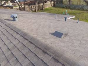 Slide of Fine Line Roofing & Design
