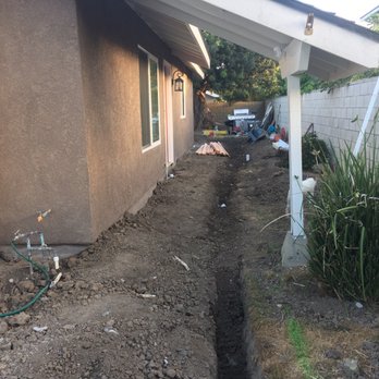 Munoz Construction - Trench ready for drainage pipe. - General Contractors Near Me Munoz Construction - Trench ready for drainage pipe. - General Contractors Near Me