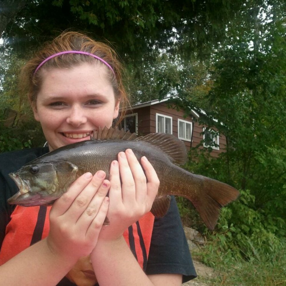Espland's - Small mouth bass caught right off the dock - Hotels Near Me - Ely, Minnesota