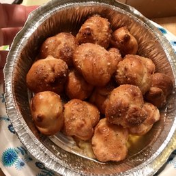 Garlic knots, swimming in oil.
