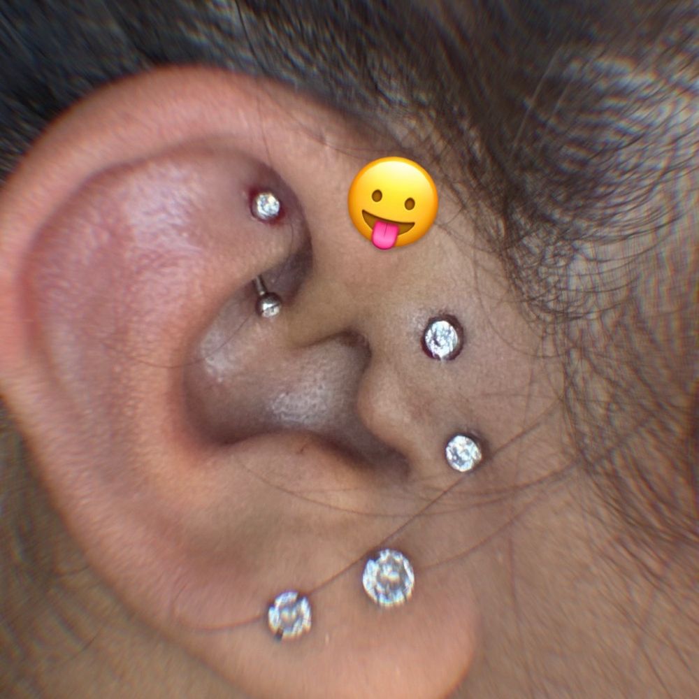 Uptown Tattoo - Surface tragus and my rook !! - Tattoo Near Me - Whittier, California Uptown Tattoo - Surface tragus and my rook !! - Tattoo Near Me - Whittier, California