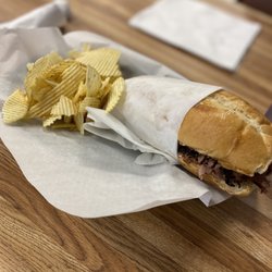 The Owls Nest Cafe - Hot Roast Beef sandwich w/ grilled jalapeños & onions and cheese