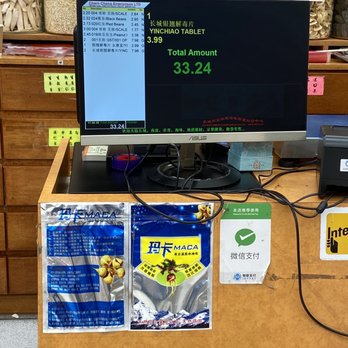 Charn Cheng Enterprises LTD - a cash counter with a computer monitor - Herbs & Spices Near Me - Vancouver, British Columbia