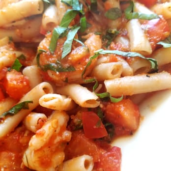 Fritto Misto - GF pasta with a chopped tomatoes and garlic sauce and sautéed shrimp. - Italian Near Me - Hermosa Beach, California Fritto Misto - GF pasta with a chopped tomatoes and garlic sauce and sautéed shrimp. - Italian Near Me - Hermosa Beach, California