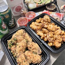two trays of food on a table two trays of food on a table