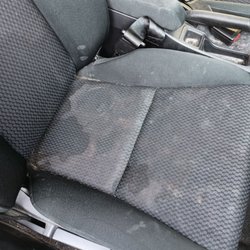 A&G Mobile Car Wash and Detailing - Stained seat before cleaning