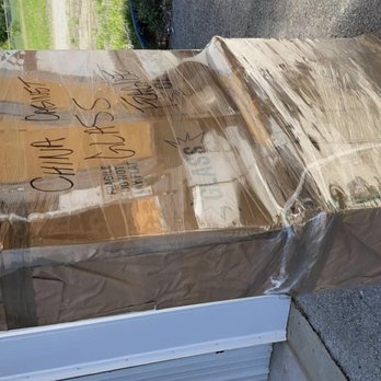 QuickSwitch Movers - China Cabinet wrapped, padded, and protected with mirror cartons. - Movers Near Me