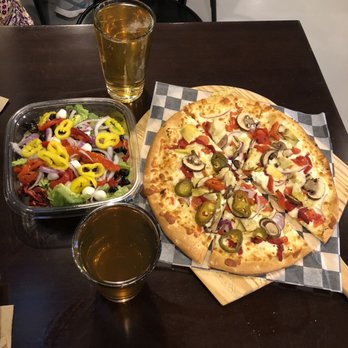 The Pizza Press - Celebration - Pizza, salad and beers - Pizza Near Me - Kissimmee, Florida The Pizza Press - Celebration - Pizza, salad and beers - Pizza Near Me - Kissimmee, Florida