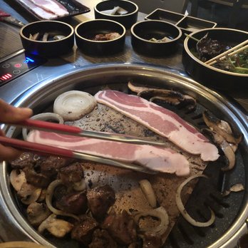Songsan Korean BBQ - Pork Belly. Thicker and larger than expected and melt in your mouth good. Banchan-cucumber kimchi was good. - Korean Near Me - Ardmore, Pennsylvania Songsan Korean BBQ - Pork Belly. Thicker and larger than expected and melt in your mouth good. Banchan-cucumber kimchi was good. - Korean Near Me - Ardmore, Pennsylvania